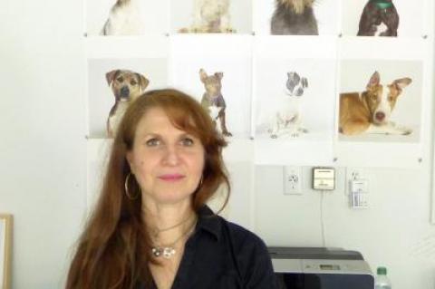 Francine Fleischer with some of her ARF subjects behind her in her studio