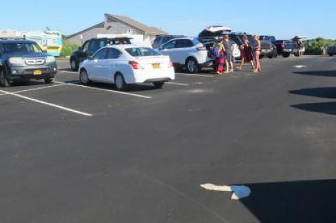 New regulations for the parking lots serving Ditch Plain Beach in Montauk are the topic of a Town Hall hearing tonight.