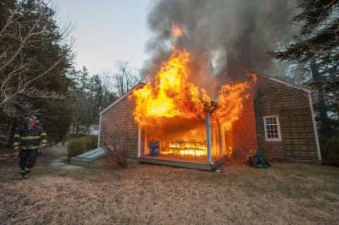 The inside of a house on Three Mile Harbor-Hog Creek Road was gutted by a fire on Tuesday morning.