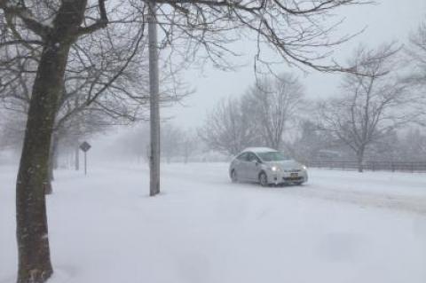 Few cars traversed Route 27 in Amagansett on Saturday afternoon during the snowstorm.