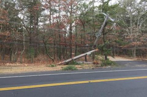 One of the two poles that a Mercedes-Benz S.U.V. struck after the driver apparently fell asleep behind the wheel on Sunday morning.