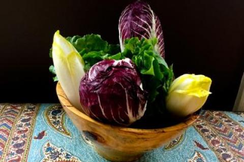 A mélange of bitter greens — in this case, escarole, radicchio, and endive — can be used raw or cooked to create different flavor profiles.