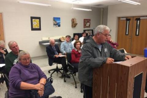 Vito Brulo, a resident of Pine Street who lives near the Cedar Street site proposed for the East Hampton School District's transportation depot, told the school board the residents would "aggressively pursue" their goal of having the district relocate the project.     Christine Sampson