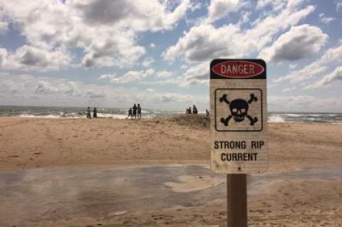 Beaches were closed to swimming due to dangerous rip currents.