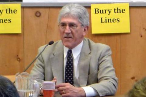 Larry Cantwell, pictured at a 2014 meeting, has said that he will not seek re-election in November. He is midway through his second two-year term as East Hampton Town supervisor.