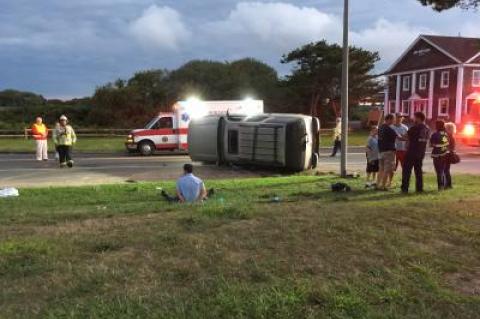 Montauk Highway was still closed at about 6 a.m., and a man was seen sitting in handcuffs on the ground while police searched the vehicle.