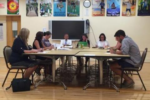 The Montauk School Board and administration are pictured during the July 19 school board meeting.