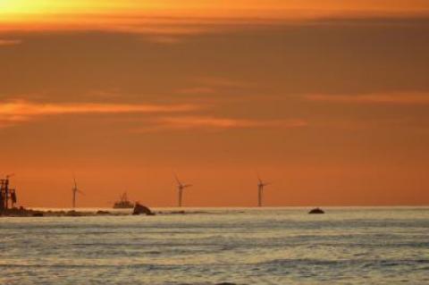 Deepwater Wind's Block Island Wind Farm, seen from Montauk, was the first offshore wind installation in the United States. The Danish company acquiring Deepwater built the world’s first offshore wind farm in 1991.