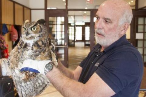 Greg Drossel and two maintenance crew members at the Ross School rescued a great horned owl on Thursday morning after it got caught in a soccer net on the athletic field.