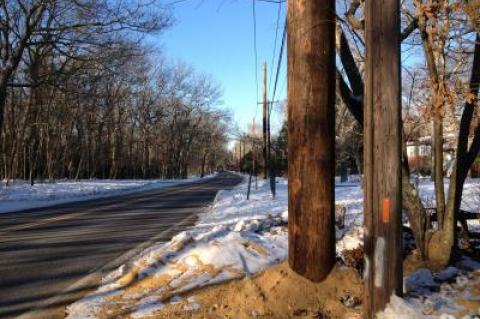 New poles have already gone up next to existing, shorter ones on much of the route, including on Town Lane in East Hampton