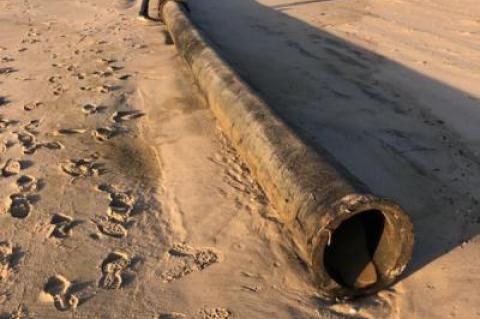 A hydraulic dredge pipe washed up on Georgica Beach Friday after a heavy rain storm on Thursday.