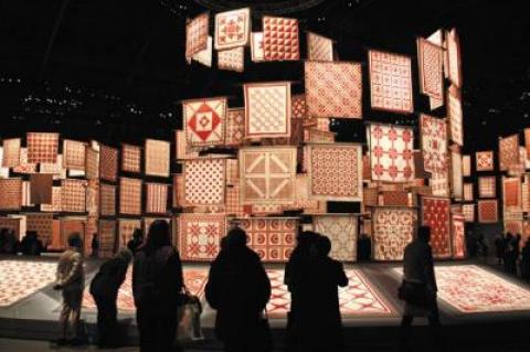 For five days the greater New York City area went cuckoo for red-and-white quilts thanks to Joanna S. Rose, the American Folk Art Museum, and Thinc Design. The 651 quilts had variations on various motifs, including message portrait, log cabin, floral, geometric, and star designs.