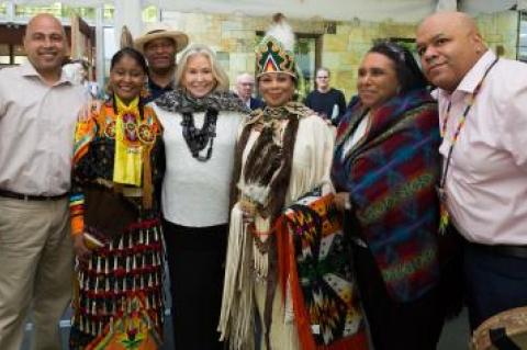 Courtney Sale Ross, the Ross School founder, with members of the Shinnecock Indian Nation at a celebration in her honor at the Ross School.