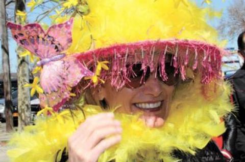 Participants in the Sag Harbor Chamber of Commerce’s Easter Bonnet Parade on Saturday vied to top (pun intended) each other with the zaniest creations. Above, the feathers in Heidi Swindells’s bonnet matched the fresh forsythia sprouting from it. Below, Melanie Pineda cozied up to the Easter Bunny.