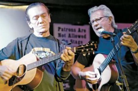 The guitarist G.E. Smith and the artist Dan Rizzie, shown at the Stephen Talkhouse in Amagansett, will perform with Carter Burwell, a composer, and Ralph Gibson, a photographer, at Bay Street Theater on Saturday.