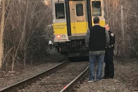 East Hampton Village police responded to investigate what led to two people being struck by an eastbound train Saturday afternoon.