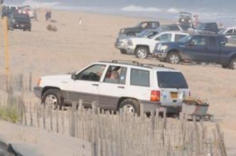 Neighbors opposed to the summertime gathering of vehicles on a stretch of Napeague Beach are stepping up efforts to stop the practice.