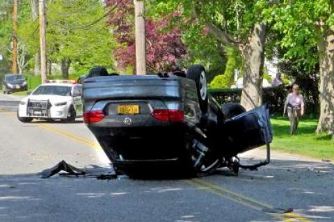 The driver of a car that flipped and landed on its roof in East Hampton on Wednesday afternoon was airlifted to Stony Brook University Hospital.