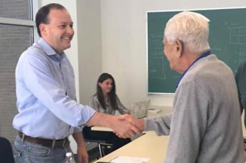 Representative Lee Zeldin, left, greeted a visitor during a mobile office hours event in Southampton in July, 2017.