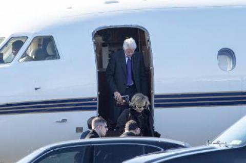 Bill and Hillary Clinton at East Hampton Airport on Saturday. They attended a funeral at St. Luke's Episcopal Church for Thomas A. Twomey, who died of a heart attack on Sunday.