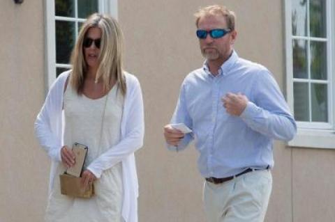 Denise and Richard Klein walked toward East Hampton Town Justice Court on Aug. 31 for his arraignment on two housing code violations.