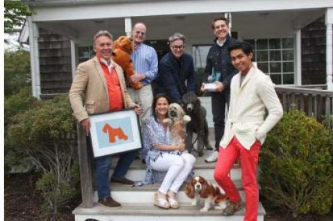 The designers of this year’s Animal Rescue Fund of the Hamptons showhouse posed with dogs and items from their rooms on the stairs of ARF’s Thrift and Treasure Shop in Sagaponack on Friday, above. Charlie, Jack Deamer’s poodle, below, presided over her master’s Toile Hall space, still in progress.