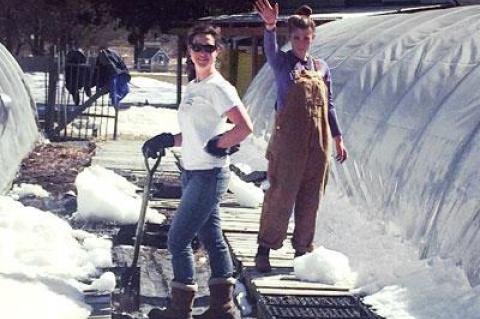 Amanda Merrow and Adrienne Nelson are readying the greenhouses to start vegetable seedling at Amber Waves, which employs a community-supported agriculture model.