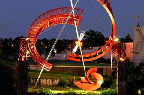 “Ghost Ballet for the East Bank Machineworks” by Alice Aycock, as seen at night.