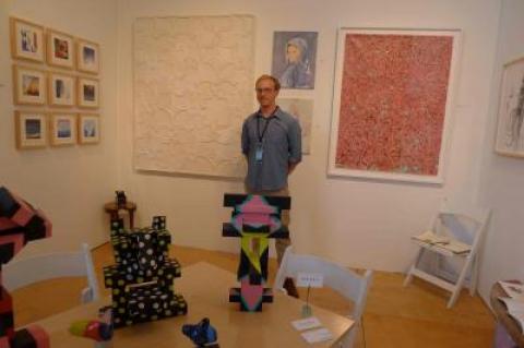 Scott Bluedorn at his booth in the Market Art + Design fair this summer