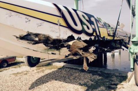 A collision with a steel buoy left a long gash in the port side of the race boat Stuart Haymim and Joey Imprescia were riding in during their record attempt.