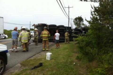 A garbage truck flipped and crashed on the Napeague stretch of Montauk Highway Friday afternoon.