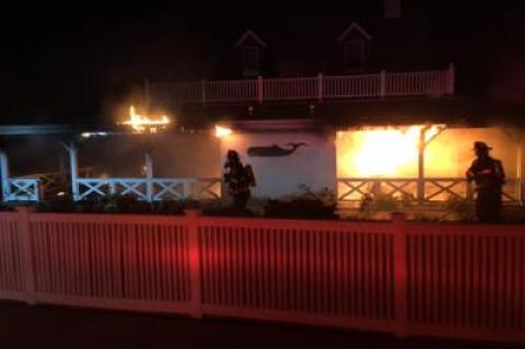 Furniture refinishing and stripping products are believed to have caused a fire that damaged an outside wall at Gosman’s Dock in Montauk on Friday night.