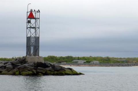 Montauk's inlet jetty with the narrow Soundview Drive beach in the background