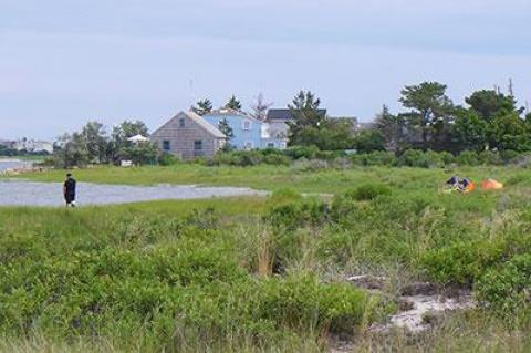 A kite surfer was found dead in the waters off Lazy Point in Amagansett on Sunday.