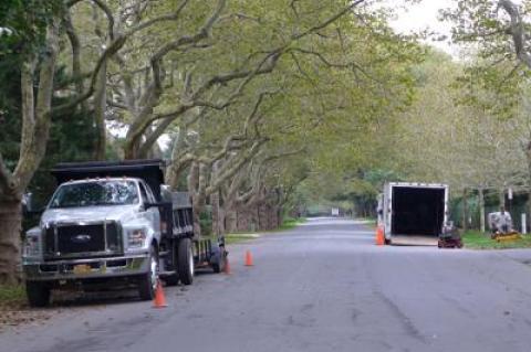 Trucks in a no-parking zone on Lily Pond Lane in East Hampton