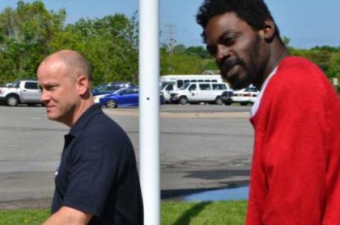 Quamine T. Taylor, right, outside East Hampton Town Justice Court on Saturday after an appearance on a 2013 arrest warrant resulted in his arrest in Westhampton.