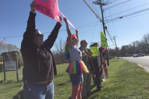 Lisa Votino-Tarrant, Zoia Foster, Bob Zelner, and the Rev. Dr. Katrina Foster displayed signs in support of marriage equality on Tuesday afternoon at Incarnation Lutheran Church.