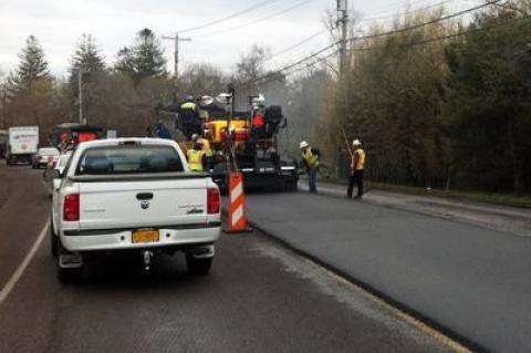 Montauk Highway resurfacing in East Hampton Village resumed on Thursday morning after a delay due to an interruption in the asphalt supply.