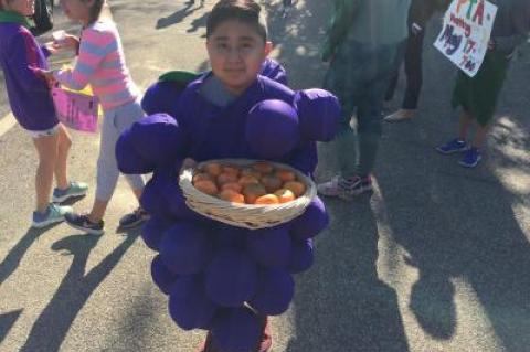 A student at the John M. Marshall Elementary School helped to promote the school's new healthy food and wellness guidelines last month. The guidelines will be rolled out in September.