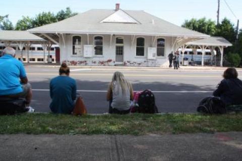 Passengers were taken off a train at the East Hampton train station Sunday morning after a bomb threat was made to Metropolitan Transportation Authority police.