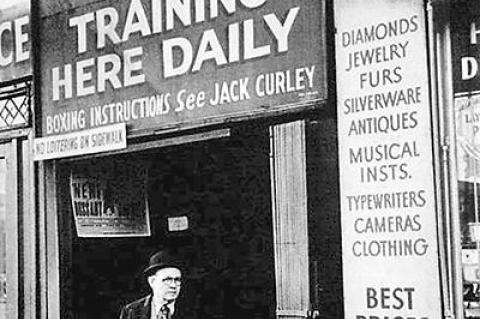 Charley Goldman, the noted boxing trainer, leaving Stillman's Gym back in its heyday.