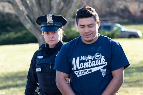 Jose J. Galvez-Garcia was led into East Hampton Town Justice Court on Tuesday afternoon. Police say he choked and stabbed a relative’s dog to death.